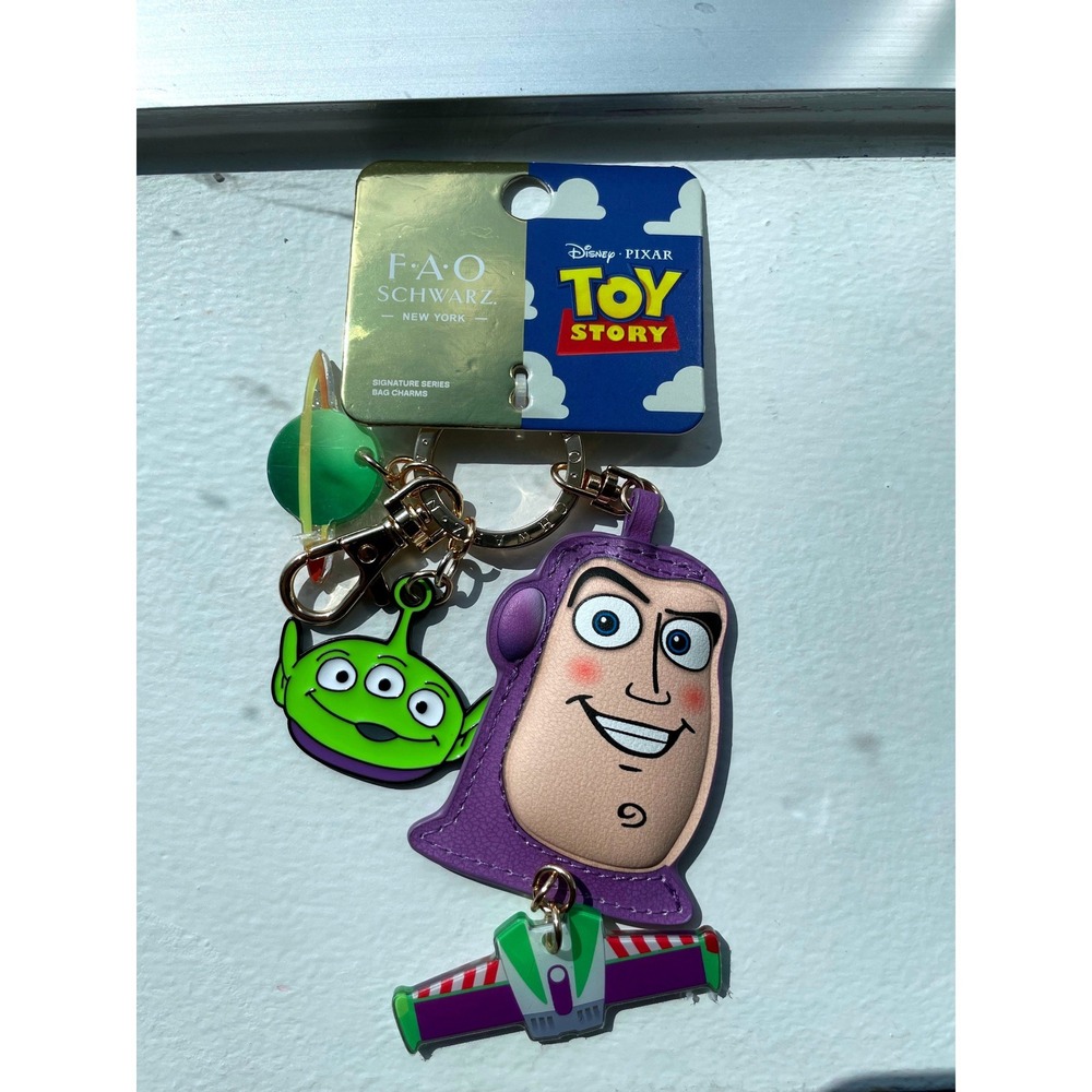 FAO Schwarz Disney Pixar Toy Story Buzz Lightyear Alien Signature Bag Charms NWT